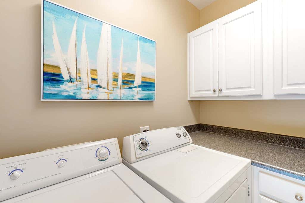 Prime location w/ private pool, elevator, game room and upper level water view 