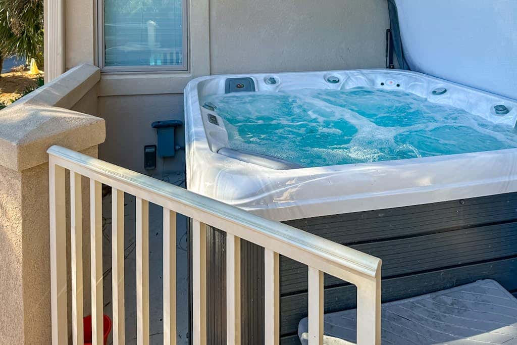 Prime location w/ private pool, elevator, game room and upper level water view 