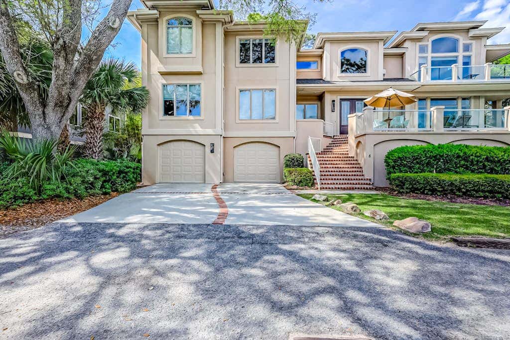 Prime location w/ private pool, elevator, game room and upper level water view 