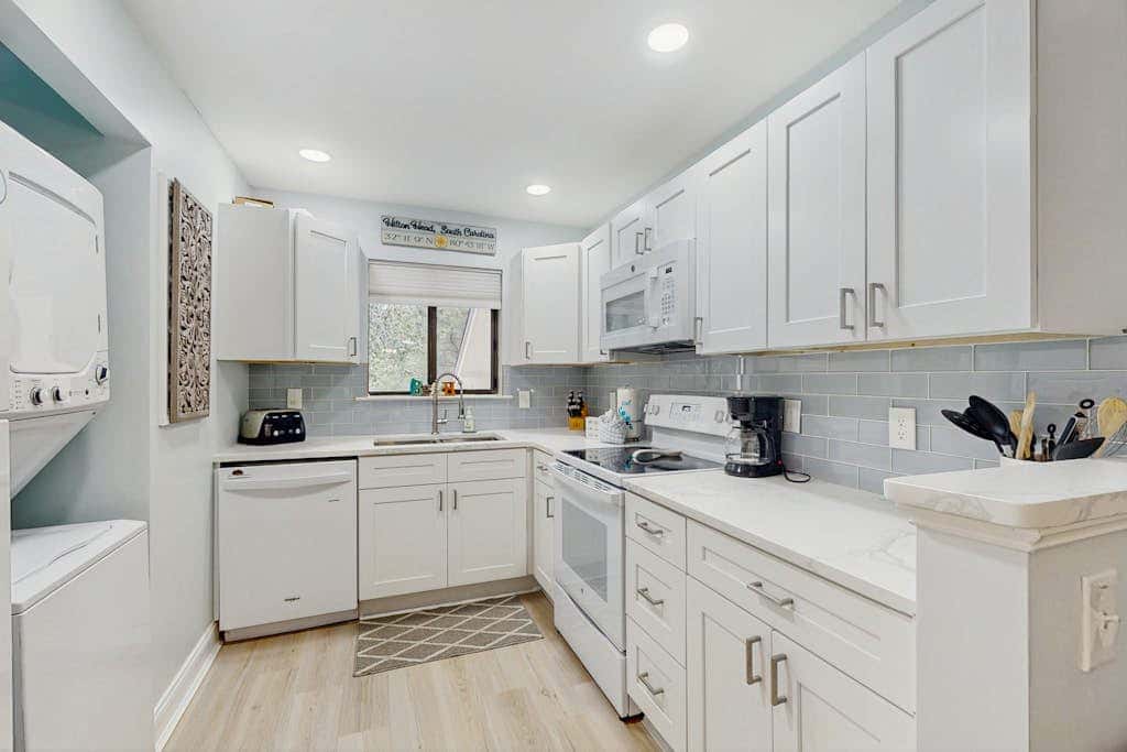 Coastal Chic Poolside Home w Large Balcony, Lagoon Views & Beach Access