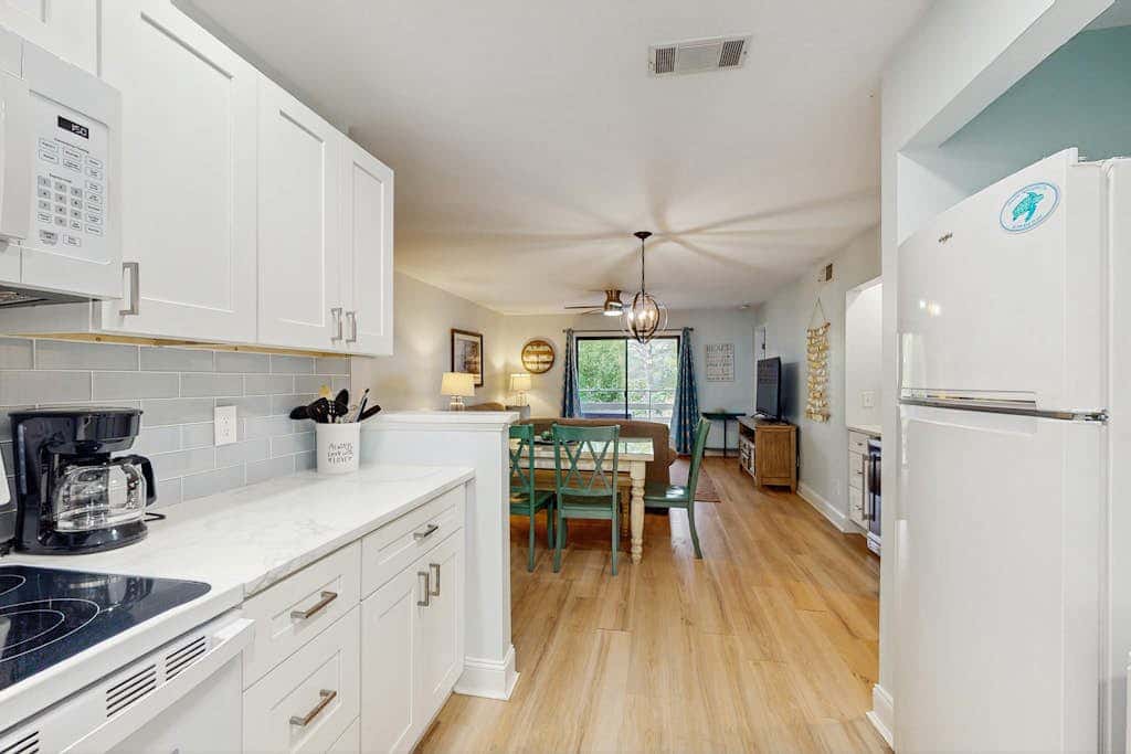 Coastal Chic Poolside Home w Large Balcony, Lagoon Views & Beach Access