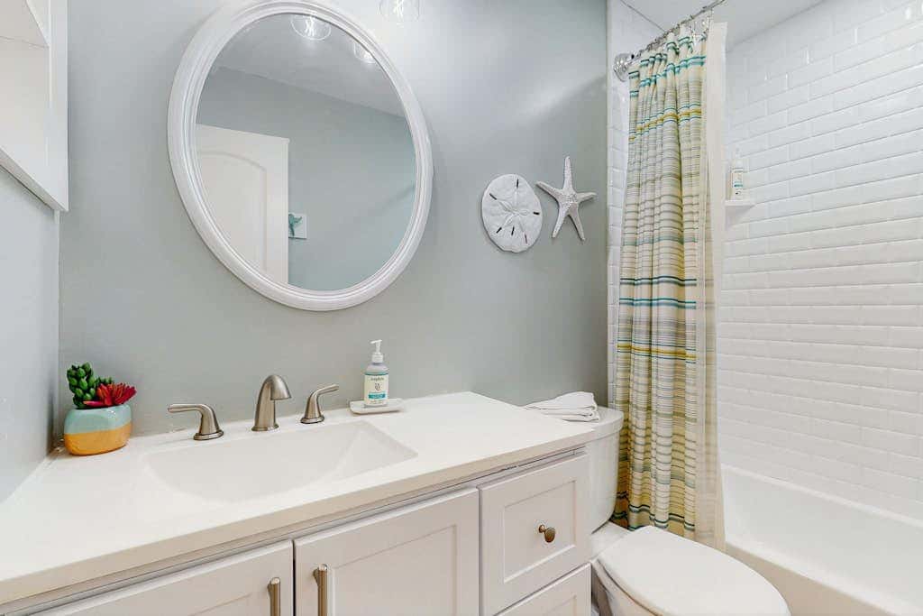 Coastal Chic Poolside Home w Large Balcony, Lagoon Views & Beach Access