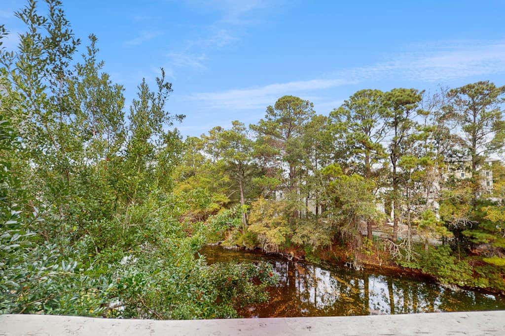 Coastal Chic Poolside Home w Large Balcony, Lagoon Views & Beach Access