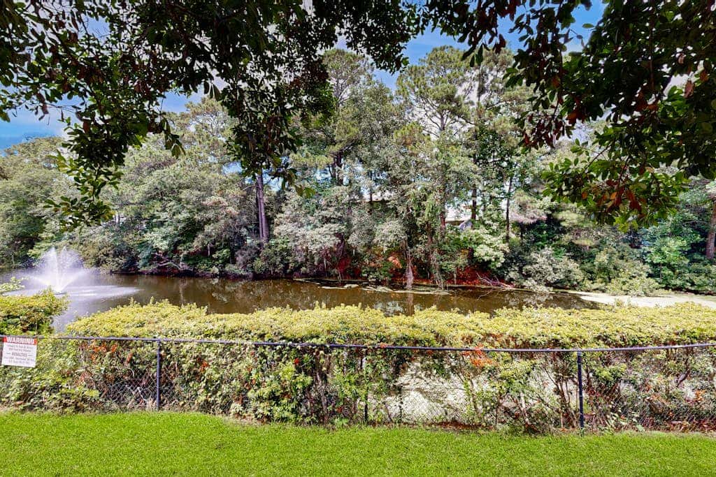 Coastal Chic Poolside Home w Large Balcony, Lagoon Views & Beach Access