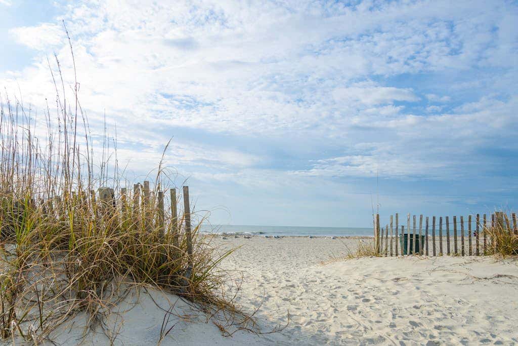 Coastal Chic Poolside Home w Large Balcony, Lagoon Views & Beach Access