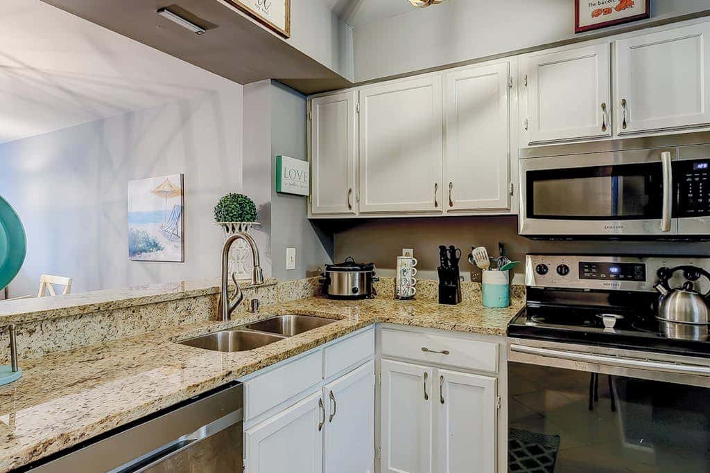 Two-story condo with pool - walk to Coligny Beach