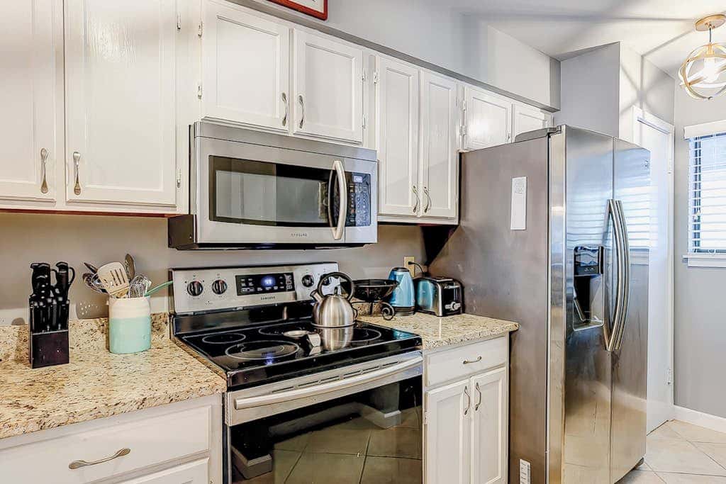Two-story condo with pool - walk to Coligny Beach