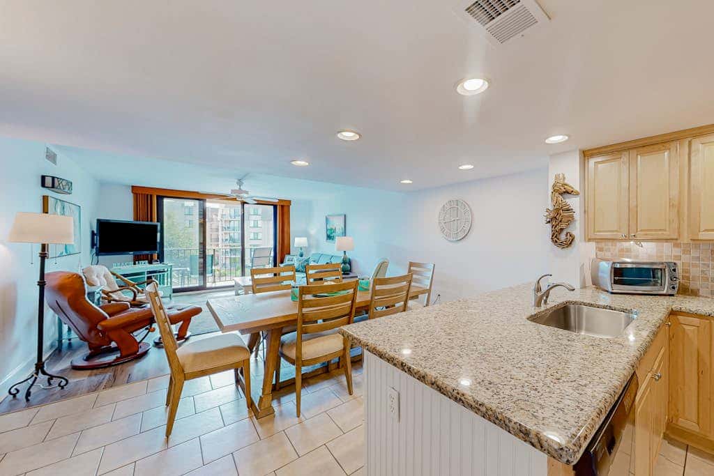 3rd-floor condo with balcony, lagoon views, pools, tennis courts, & beach access