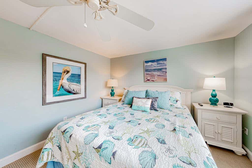 3rd-floor condo with balcony, lagoon views, pools, tennis courts, & beach access