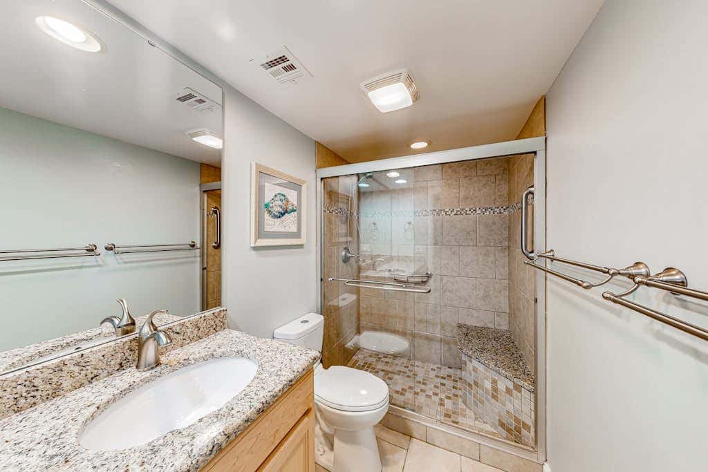 3rd-floor condo with balcony, lagoon views, pools, tennis courts, & beach access