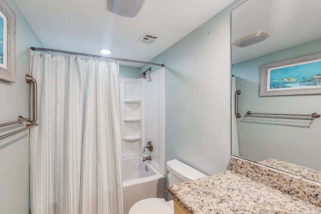 3rd-floor condo with balcony, lagoon views, pools, tennis courts, & beach access