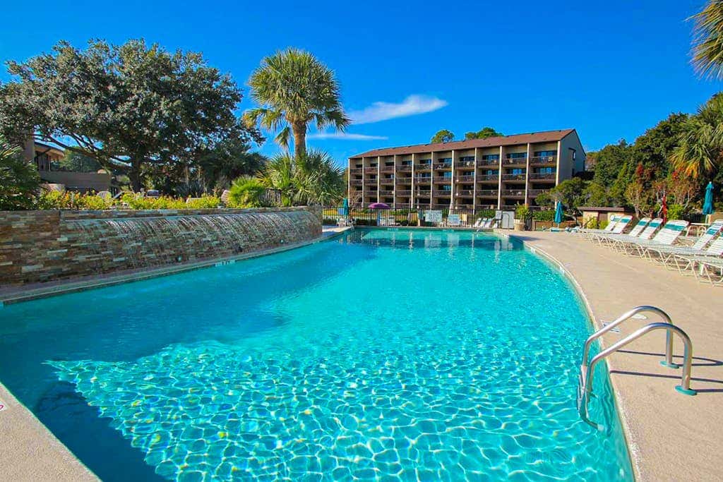 3rd-floor condo with balcony, lagoon views, pools, tennis courts, & beach access