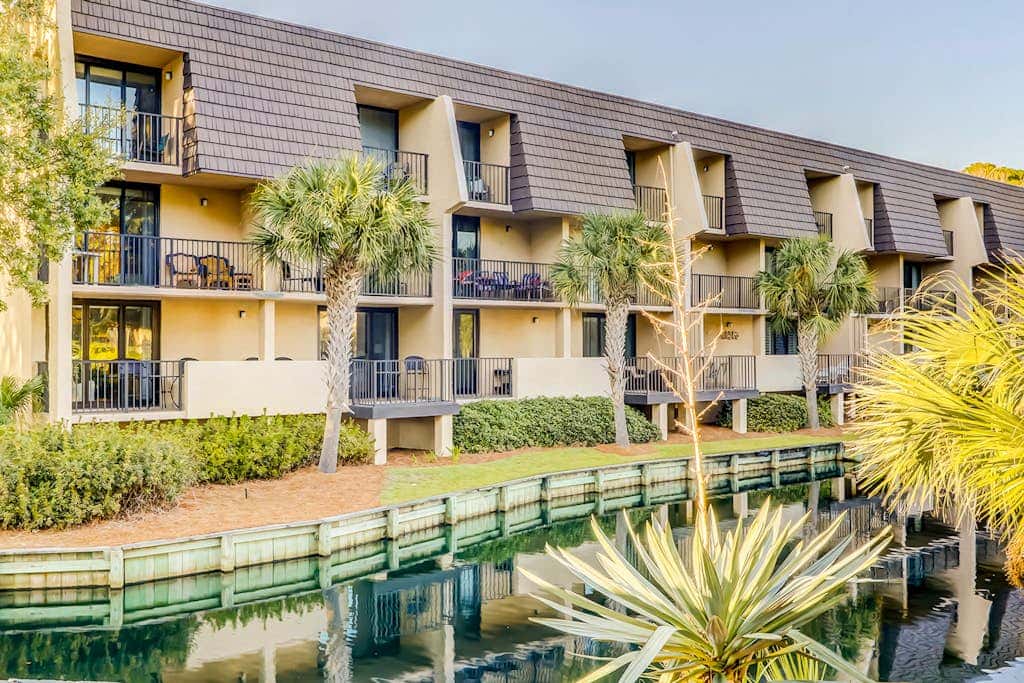 3rd-floor condo with balcony, lagoon views, pools, tennis courts, & beach access