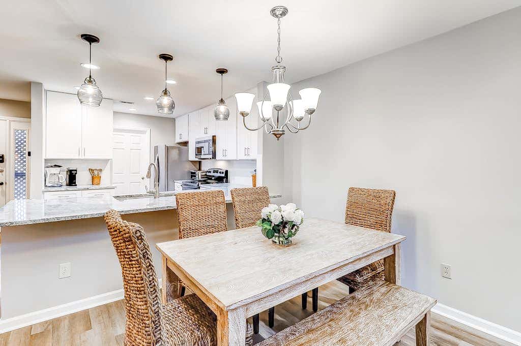 Sun-kissed bliss at Colonnade Club with dual suites, deck, shared pool, hot tub