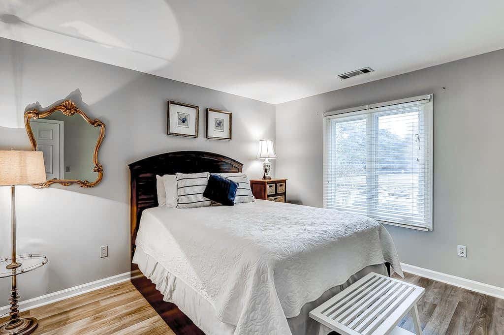 Sun-kissed bliss at Colonnade Club with dual suites, deck, shared pool, hot tub