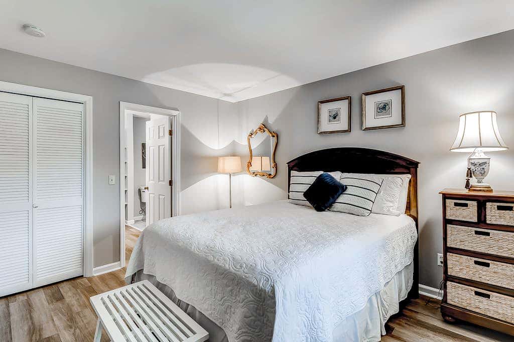 Sun-kissed bliss at Colonnade Club with dual suites, deck, shared pool, hot tub