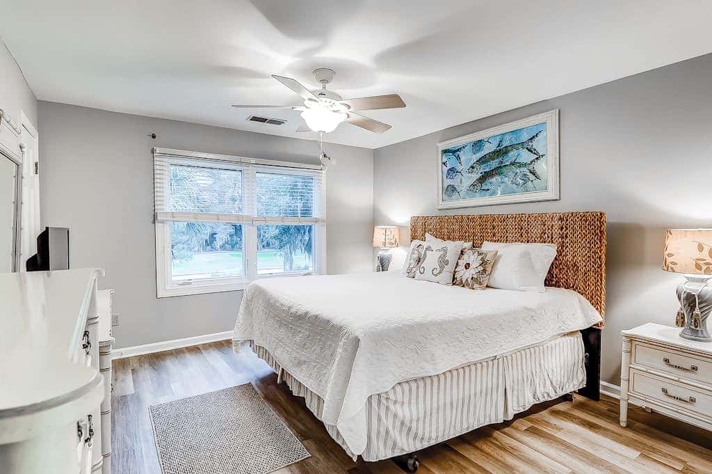 Sun-kissed bliss at Colonnade Club with dual suites, deck, shared pool, hot tub