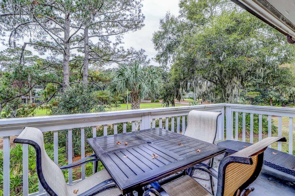 Sun-kissed bliss at Colonnade Club with dual suites, deck, shared pool, hot tub