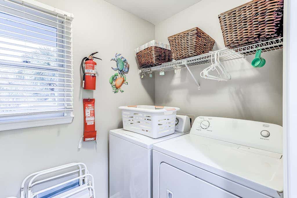 Sun-kissed bliss at Colonnade Club with dual suites, deck, shared pool, hot tub