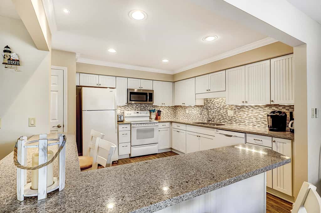 Relaxing First Floor Condo  Walk to Beach Spacious Deck Remote Work Setup 
