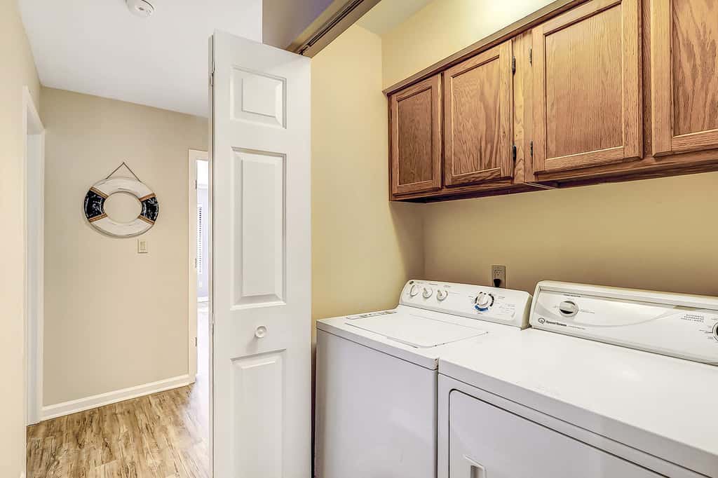 Relaxing First Floor Condo  Walk to Beach Spacious Deck Remote Work Setup 