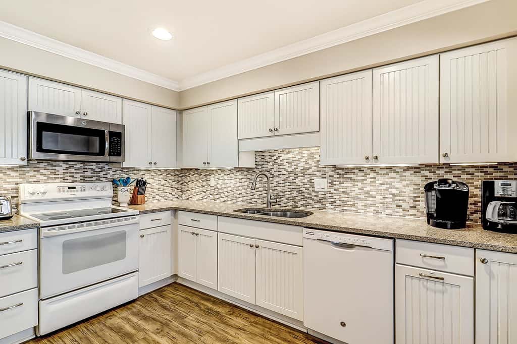 Relaxing First Floor Condo  Walk to Beach Spacious Deck Remote Work Setup 