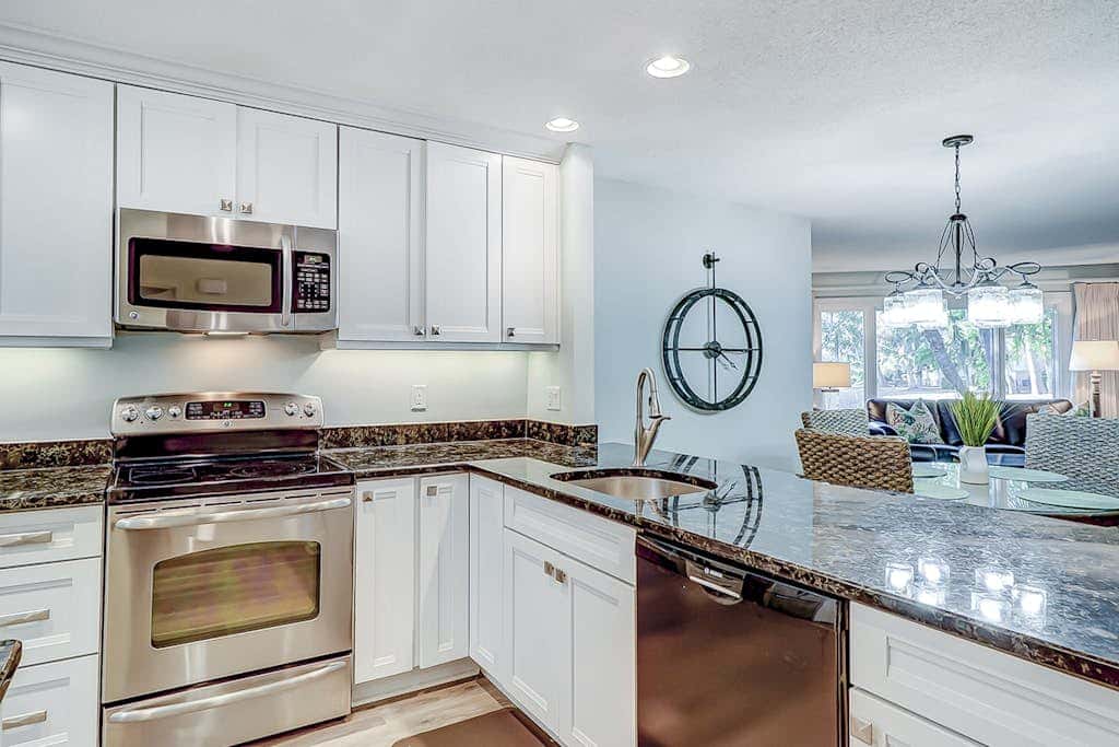 Stylish Villa with Fast WiFi, Shared Pool, & Hot Tub - Mile from the Beach
