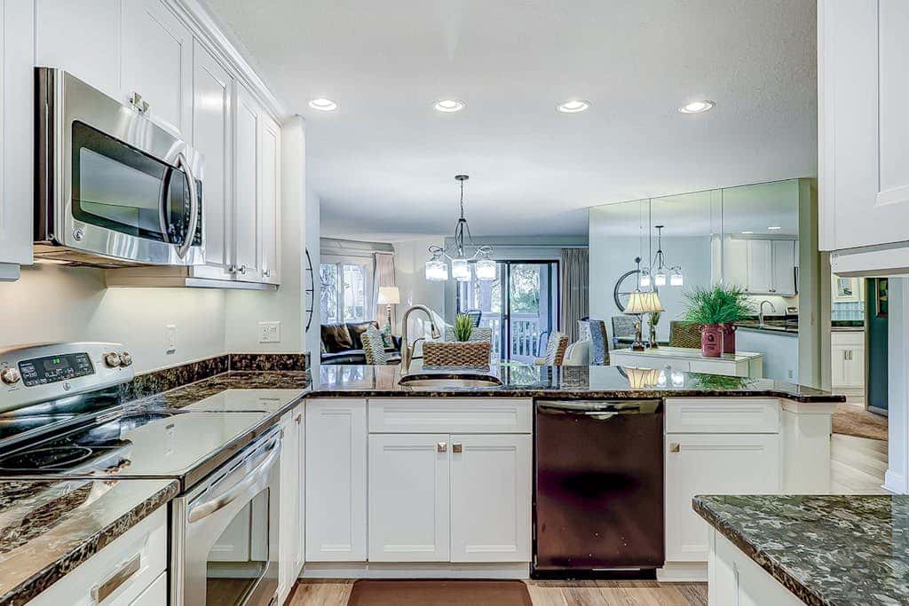 Stylish Villa with Fast WiFi, Shared Pool, & Hot Tub - Mile from the Beach