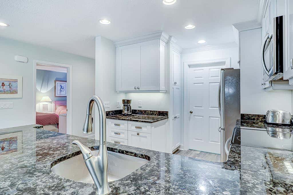 Stylish Villa with Fast WiFi, Shared Pool, & Hot Tub - Mile from the Beach