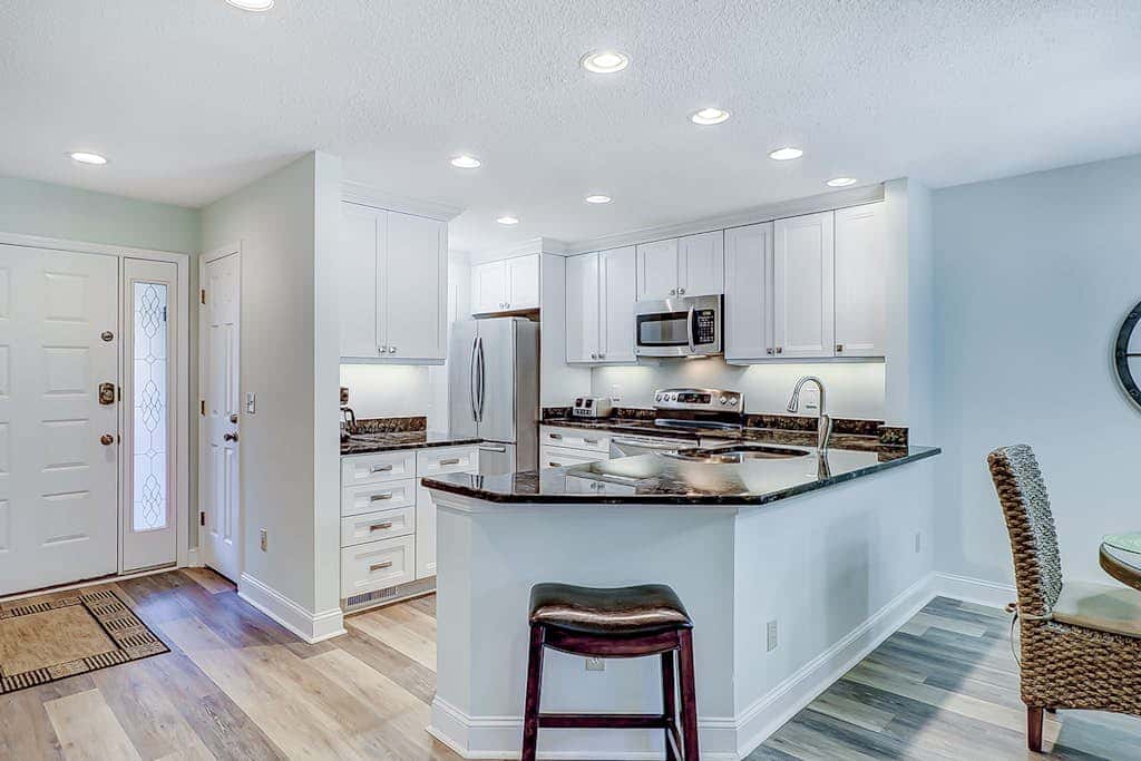 Stylish Villa with Fast WiFi, Shared Pool, & Hot Tub - Mile from the Beach