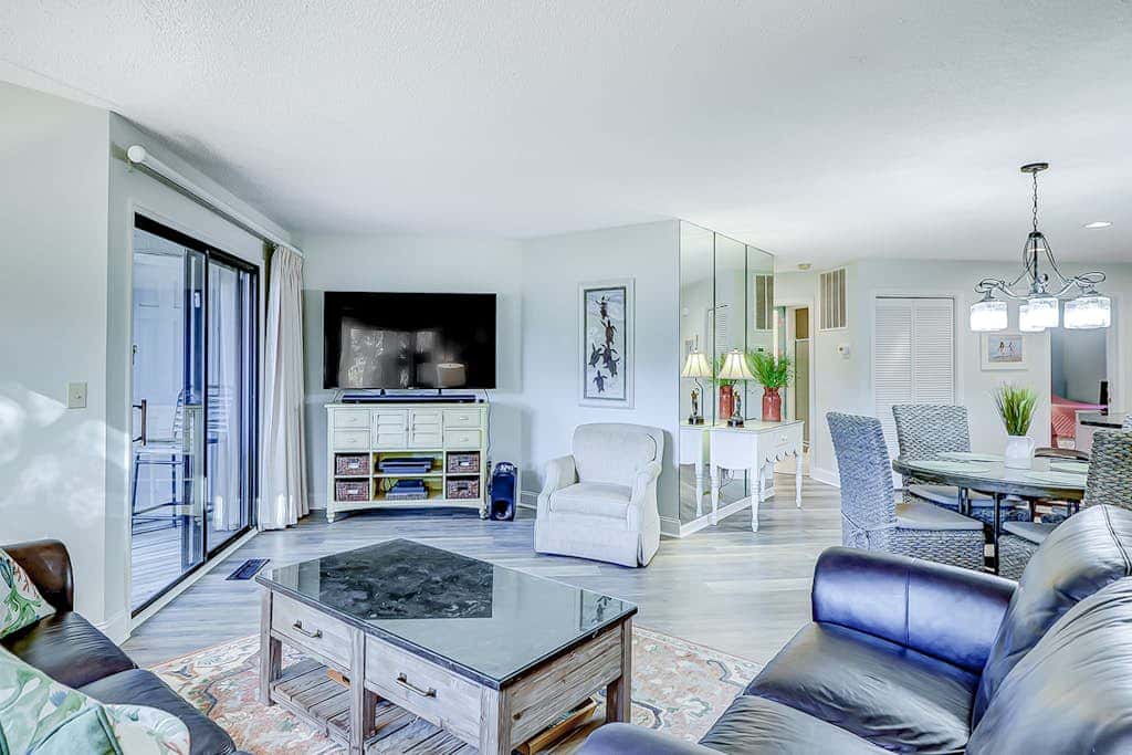 Stylish Villa with Fast WiFi, Shared Pool, & Hot Tub - Mile from the Beach