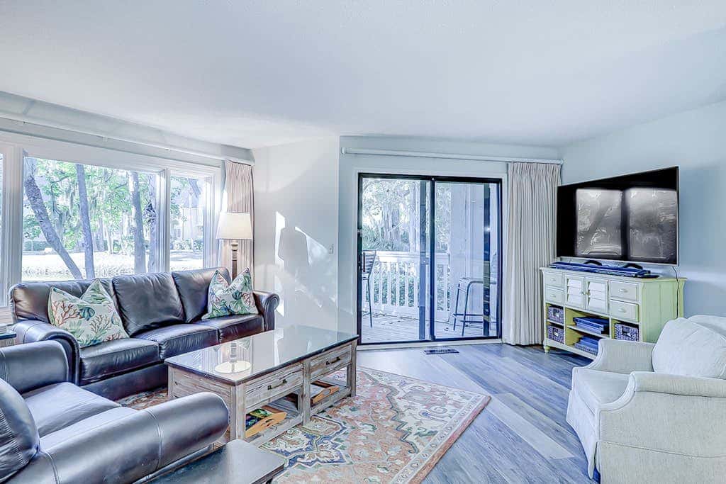 Stylish Villa with Fast WiFi, Shared Pool, & Hot Tub - Mile from the Beach