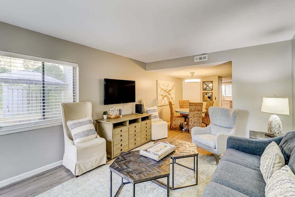 Snowbird dog friendly villa with WiFi, 2 patios, & grill  pool beach access