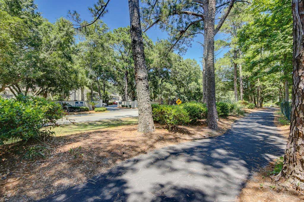 Snowbird dog friendly villa with WiFi, 2 patios, & grill  pool beach access