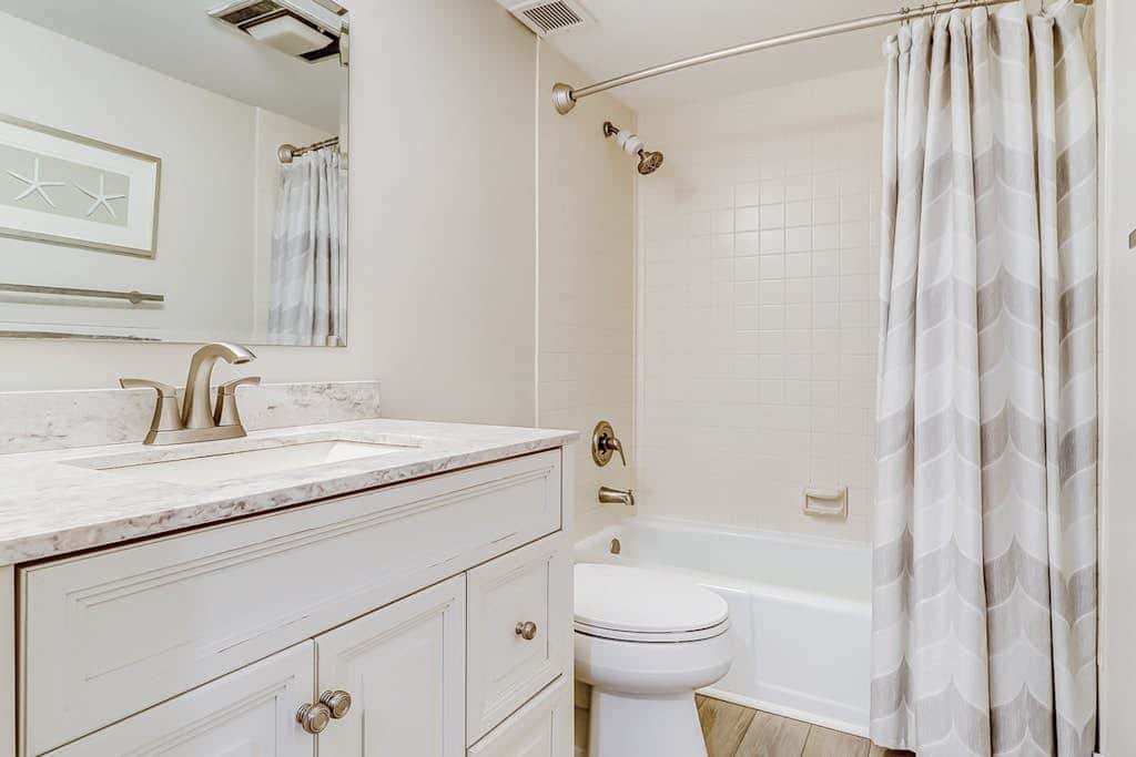 Beachfront escape with pools, hot tub, WiFi, washer dryer, & central AC