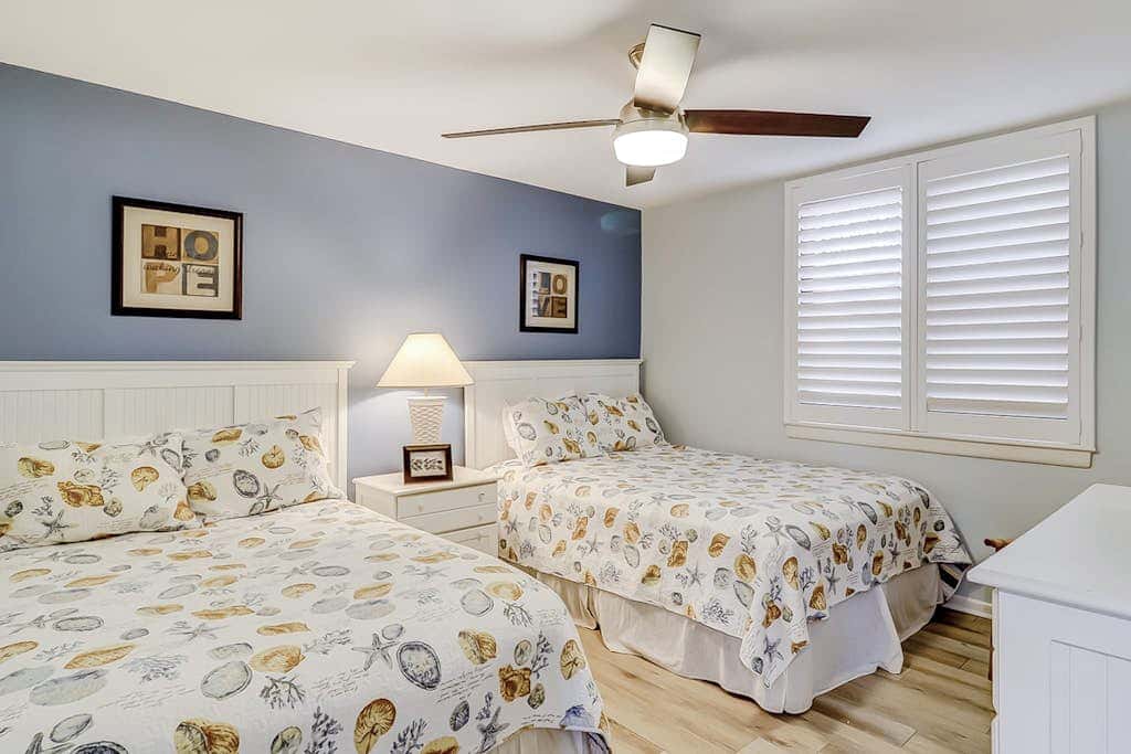 Beachfront escape with pools, hot tub, WiFi, washer dryer, & central AC
