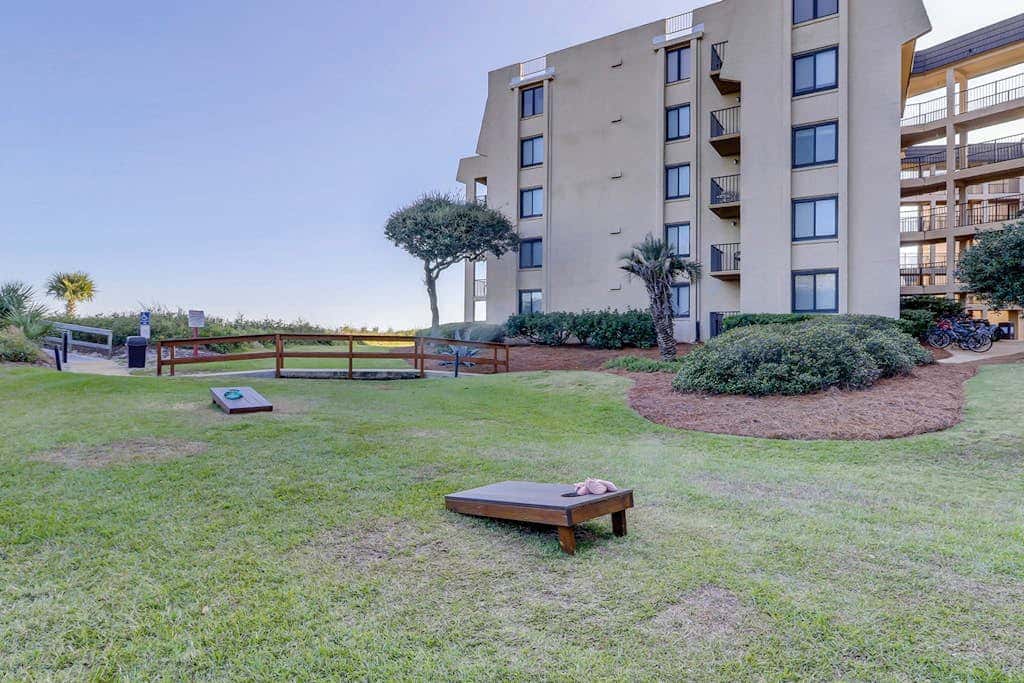Beachfront escape with pools, hot tub, WiFi, washer dryer, & central AC