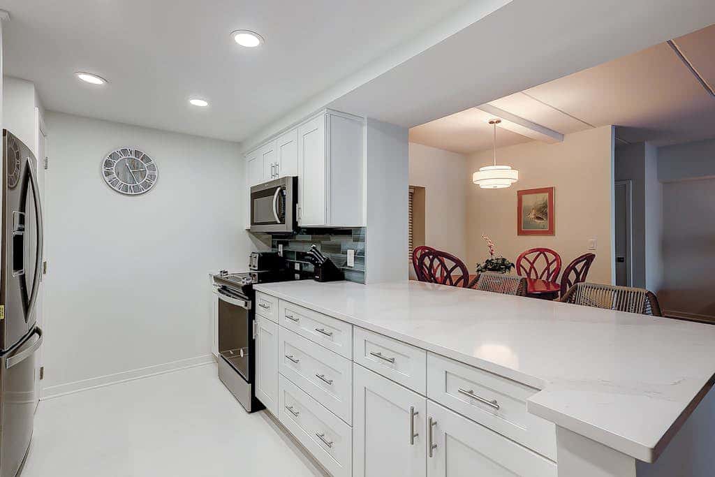 Cozy condo with tennis, pool, beach access, & private furnished balcony