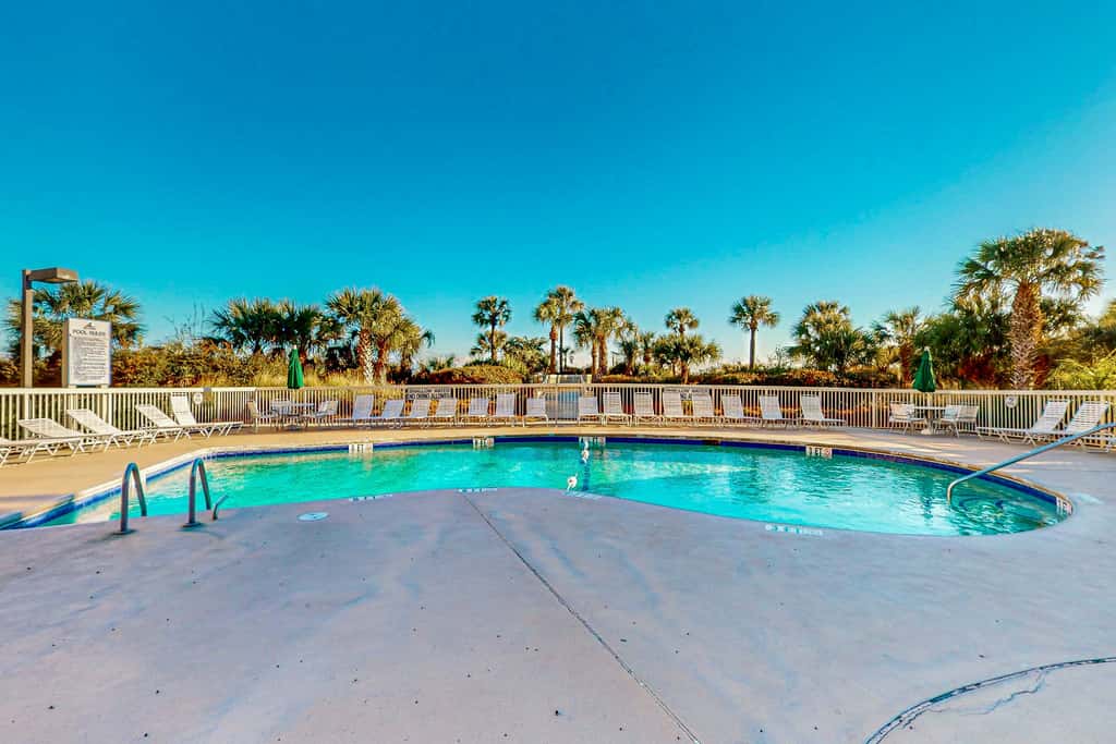 Beach-view condo in oceanfront complex with outdoor pool, beach access & balcony