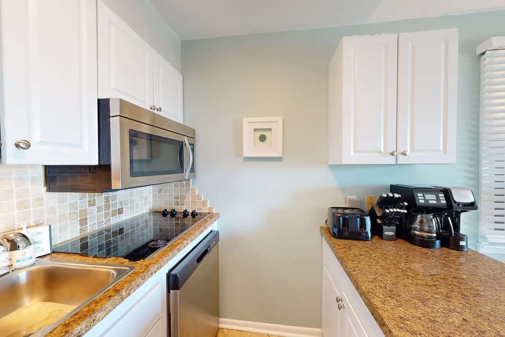 Beach-view condo in oceanfront complex with outdoor pool, beach access & balcony