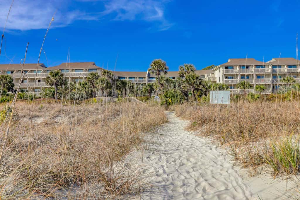 Beach-view condo in oceanfront complex with outdoor pool, beach access & balcony