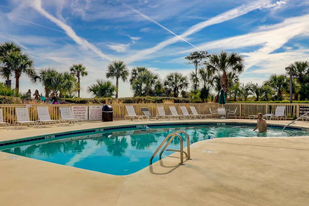Beach-view condo in oceanfront complex with outdoor pool, beach access & balcony
