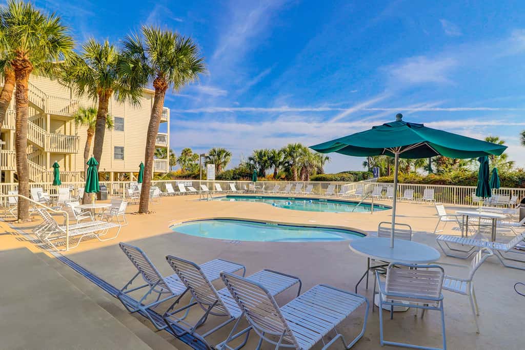 Beach-view condo in oceanfront complex with outdoor pool, beach access & balcony