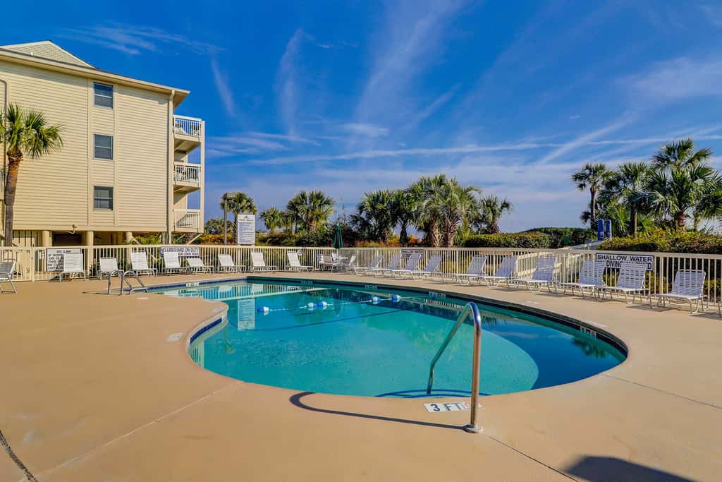 Beach-view condo in oceanfront complex with outdoor pool, beach access & balcony