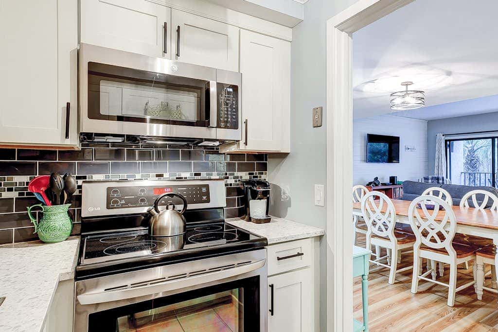 Family-friendly condo near the beach with balcony, central AC, & shared pool