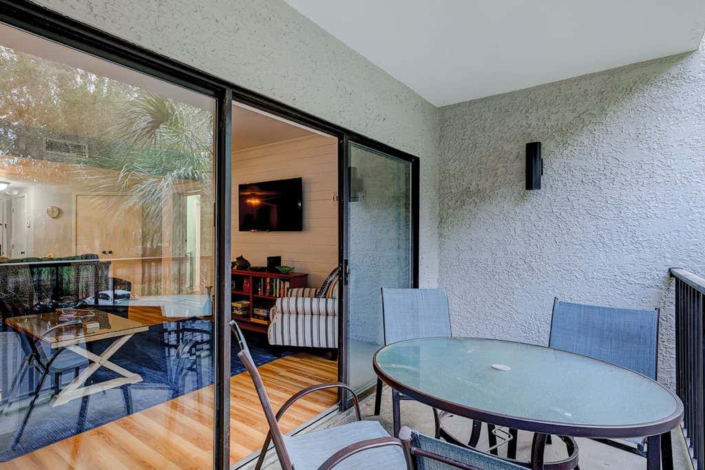 Family-friendly condo near the beach with balcony, central AC, & shared pool