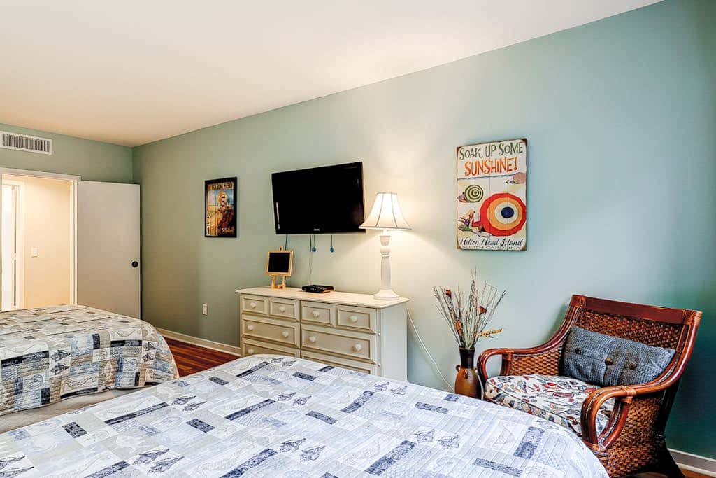 Family-friendly condo near the beach with balcony, central AC, & shared pool