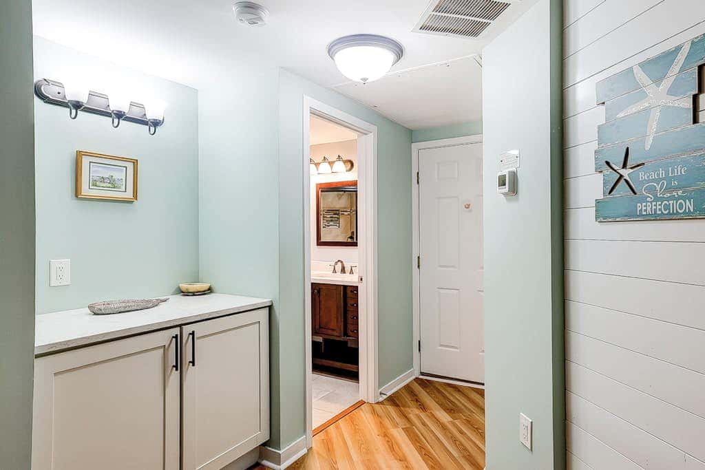 Family-friendly condo near the beach with balcony, central AC, & shared pool