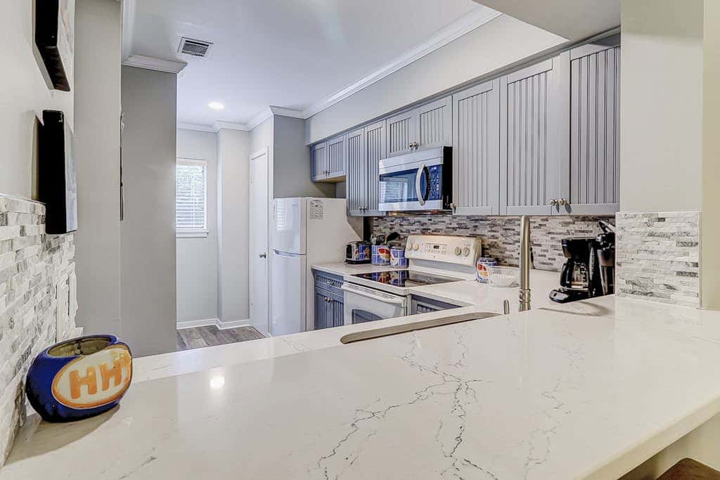Well appointed home with path to the beach, pool, private washer, dryer & AC