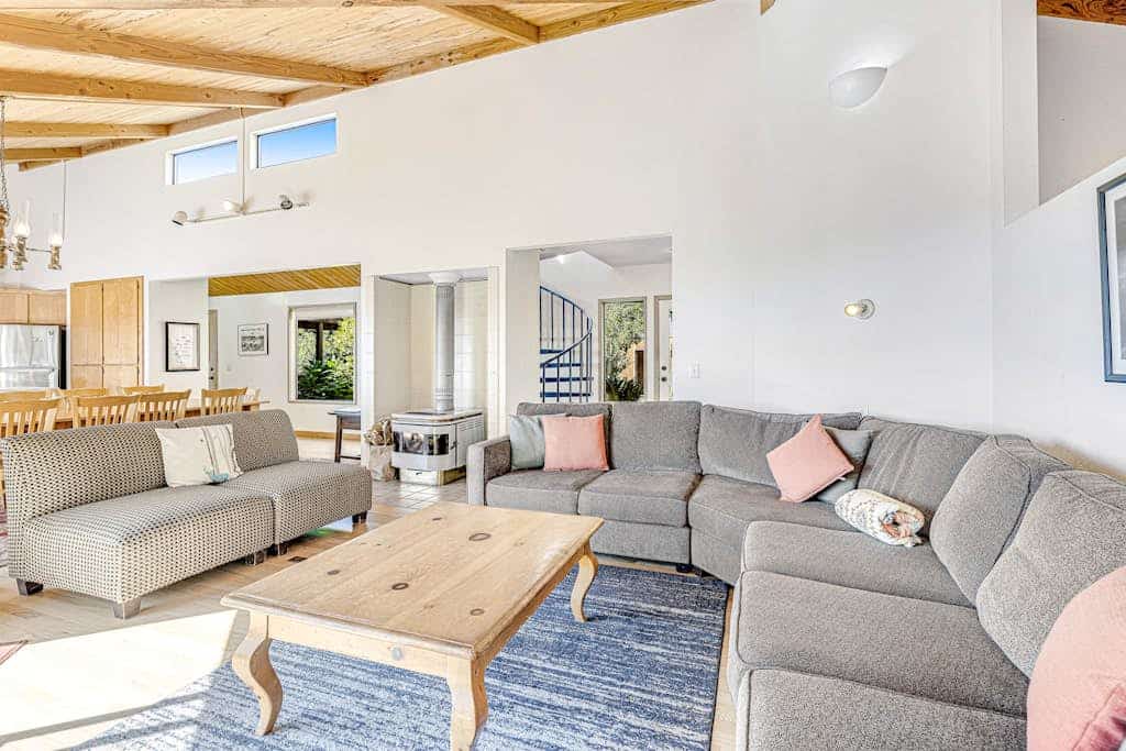 Settle into a home where the ocean is always part of the conversation. Soak in the hot tub as the sun dips below the Pacific. Your deck is a front-row seat to the Pacific. Room for 8 in this 3-bedroom home. A short walk from the heated community pool. Trails, tidepools, and two heated community pools -- all within reach. The bluff trail starts steps from the door, winding along the cliffs above crashing whitecaps.